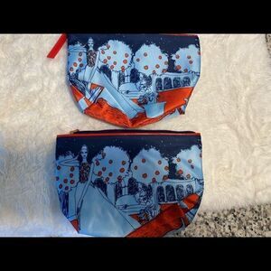 NWOT set of two Estée Lauder cosmetic bags.